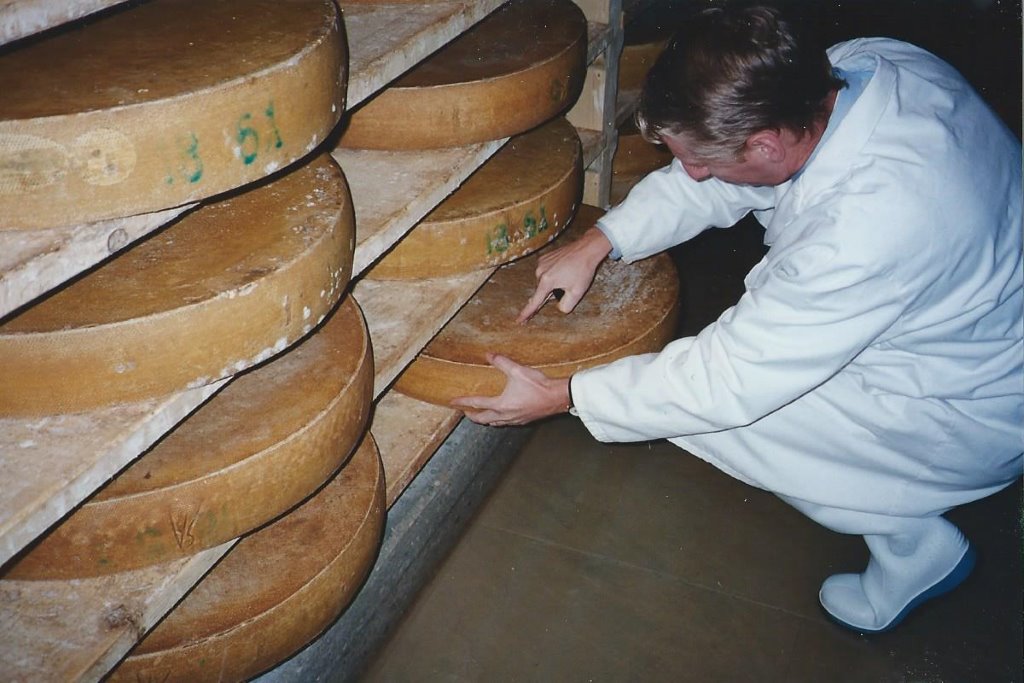 Pictured are wheels of Comte aging, an example of affinage.