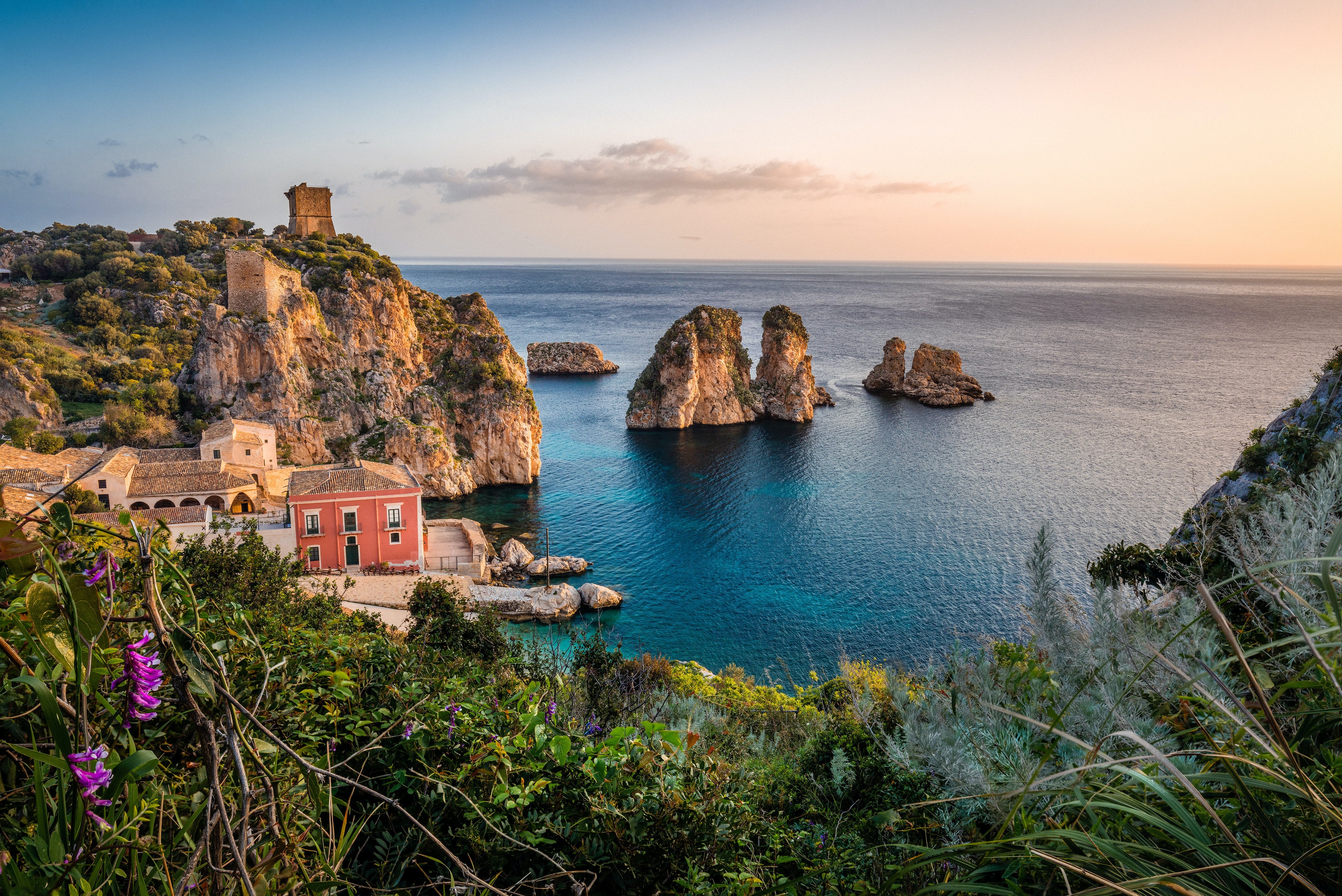 An example of Sicily's jagged coastline comprised of limestone, tuff and clay..